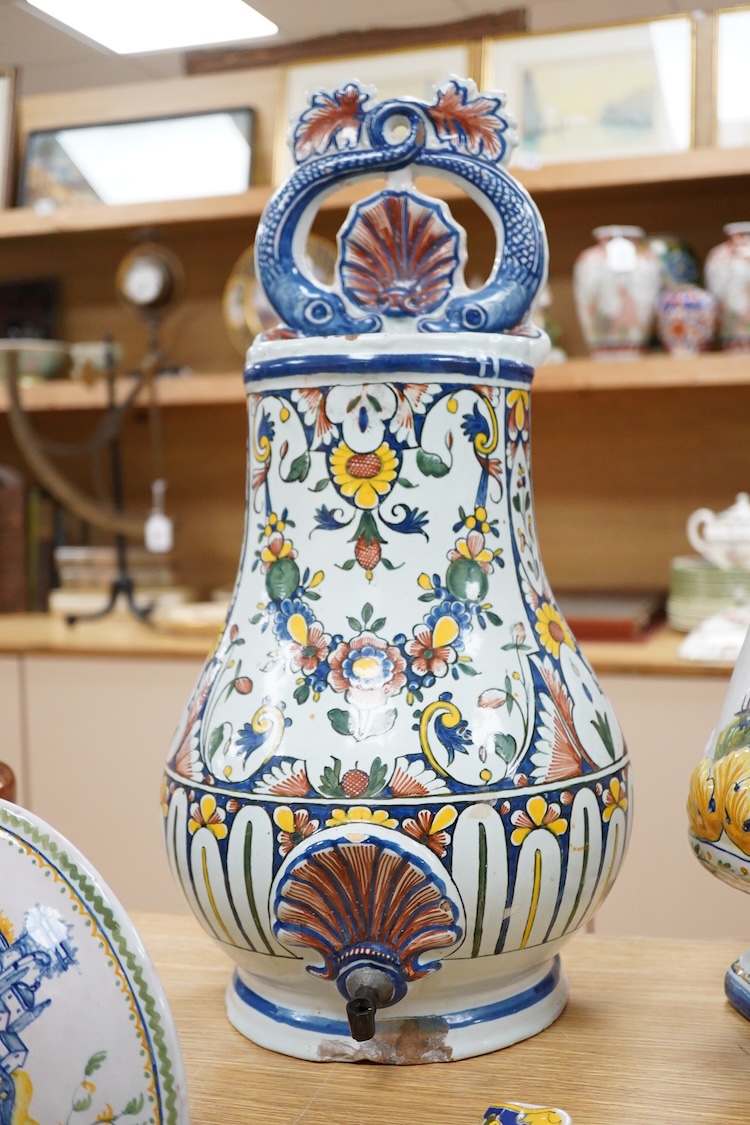 Two French faience large water wall cisterns, a wall pocket and wall bracket, largest 58cm high